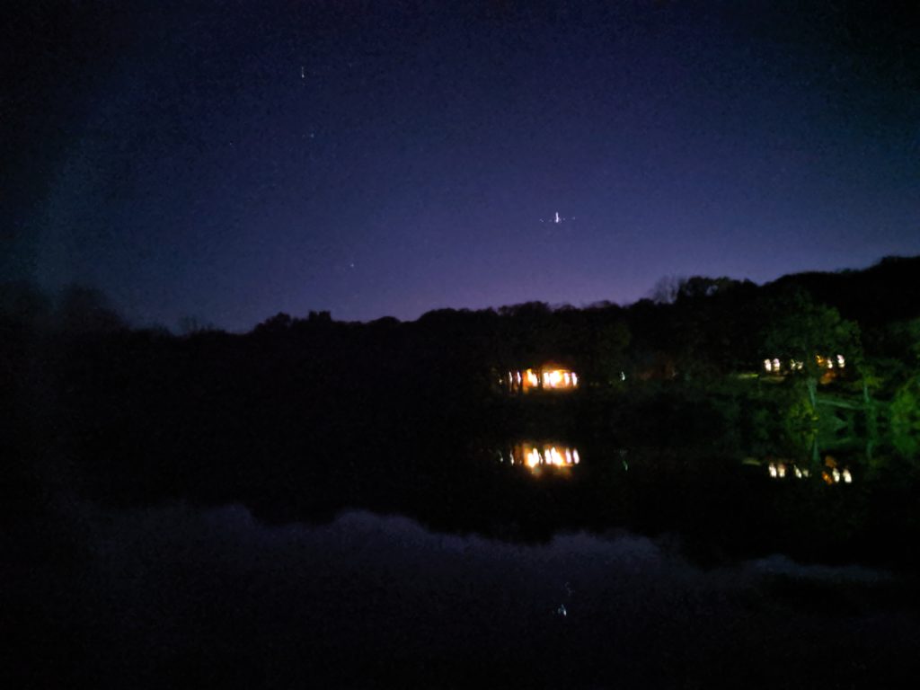 Cabin lights and night sky at Wildwood