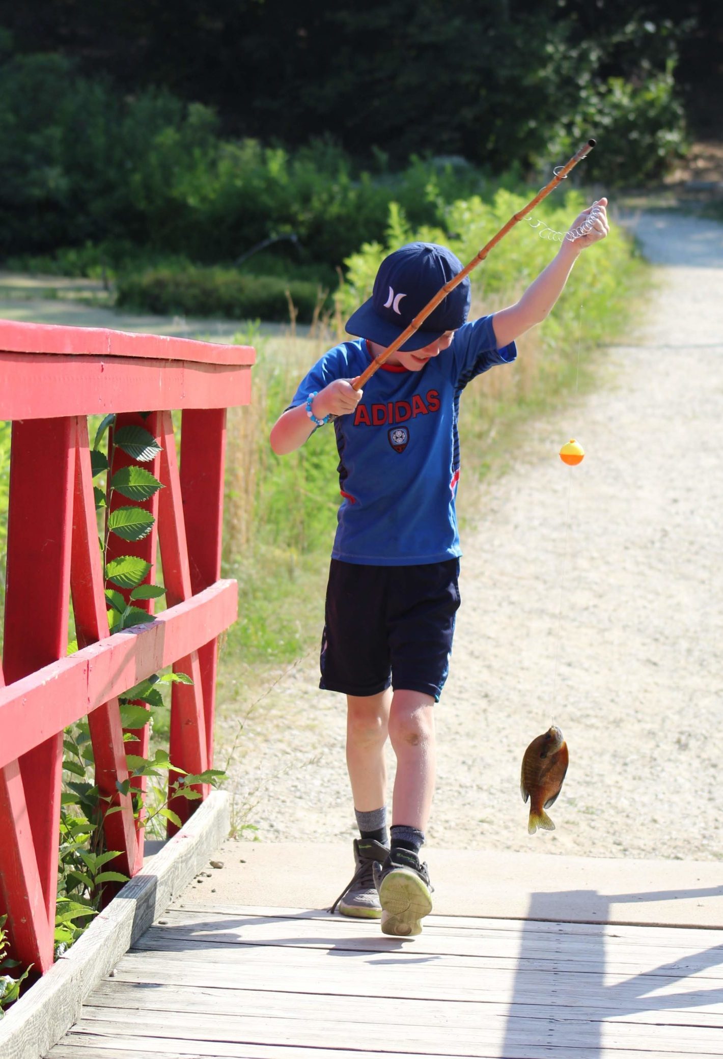 Among other activities, Wildwood campers learn to fish!